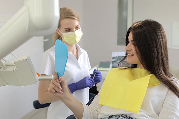 How A Cosmetic Dentist Can Boost Your Smile